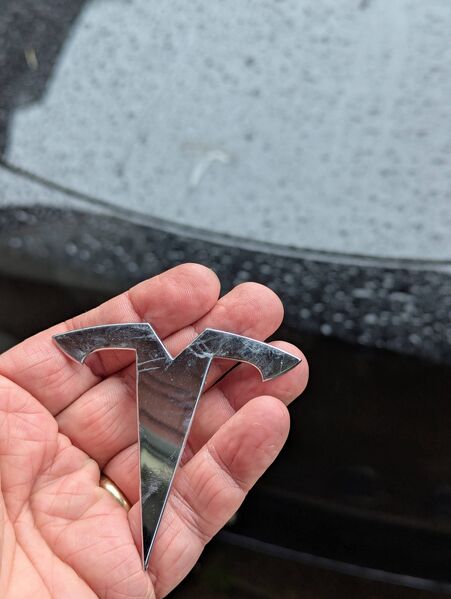 File:Debadge-tesla.jpg